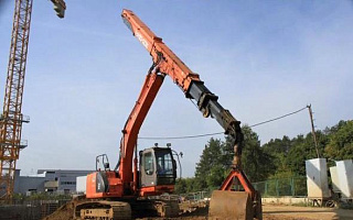 Гусеничный экскаватор с грейфером 24 м Хитачи-225