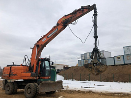 Колесный экскаватор Дуссан 190