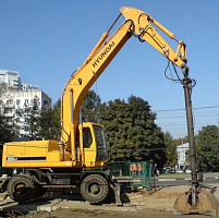 Колесный экскаватор Хендай 200й