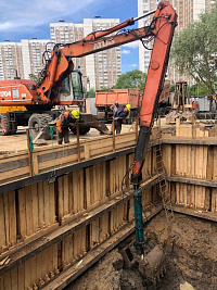 Колесный экскаватор с грейфером 18 м Атлас-1704