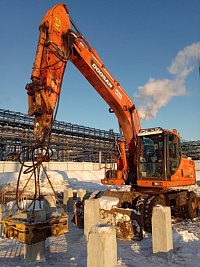 Скусыватель свай на базе колёсного Экск дуссан 190